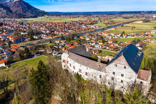 Germany, Marquartstein, Bavaria, Aerial view of Marquartstein Castle and surrounding village in summer