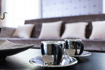 Close-up view of tea cups on table