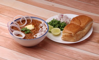 Pav Bhaji Indian spicy fast food with bread, onion and butter, Indian food, Mumbai food