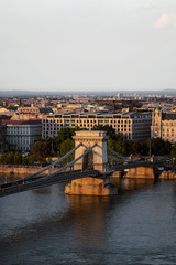 Obraz premium bridge old and beautiful in europe city in river in sunset good light with city 