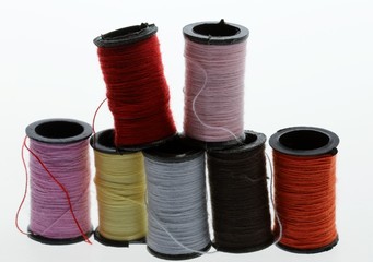 Spools of colorful sewing thread