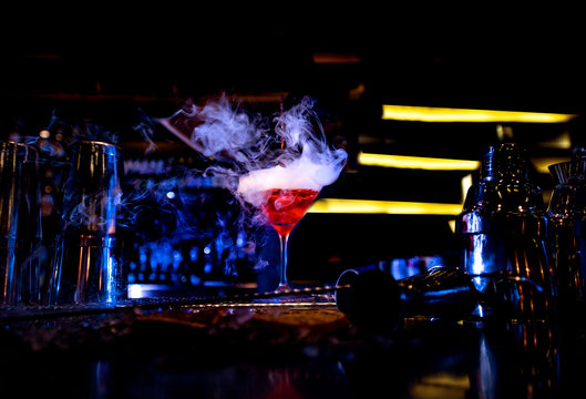Close-up of cocktail on bar counter in nightclub
