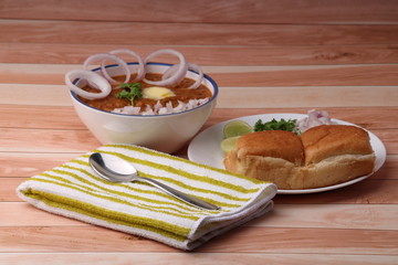 Pav Bhaji Indian spicy fast food with bread, onion and butter, Indian food, Mumbai food