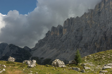 On trail from Coldai refuge via Coldai lake to Vazzoler refuge, along Civetta mountain range from north to south, stage 9 of Alta Via 1 classic long trek in the Dolomites, South Tirol, Italy.