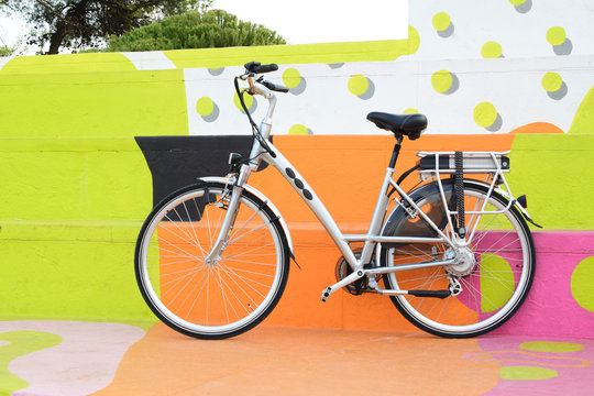electric bicycle on the colourful background, e-bike, city bike