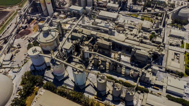 Aerial view on a huge heavy industrial factory complex at Nesher, Israel, drone 4k
