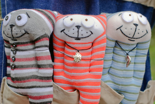 Three Funny Knitted Cats Made By Hands For Children