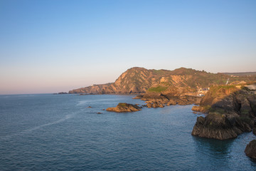 View from the Capstone Hill towards Beacon Point at sunset, Ilfracombe, Devon, UK