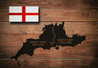 Map of South West and South East, regions of England, flag of England, on wooden background, 3D illustration