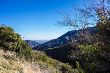 Peekaboo Views of the San Gabriel Valley through the Mountains of the Angeles National Forest outside of Los Angeles, California, USA