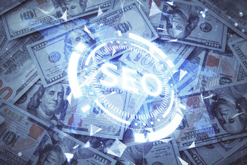 Double exposure of seo drawing over us dollars bill background. Concept of search optimization.