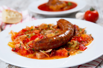 Sausage with vegetables on a plate