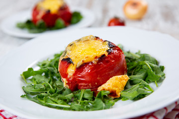 Stuffed tomatoes. Tomatoes baked with cheese and meat