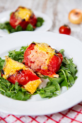 Stuffed tomatoes. Tomatoes baked with cheese and meat