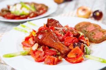 Chicken with tomatoes and vegetables