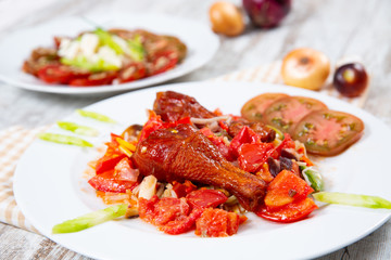 Chicken with tomatoes and vegetables