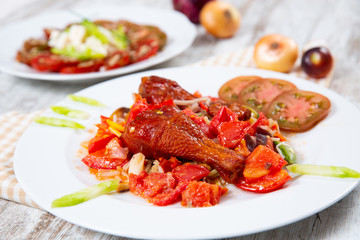 Chicken with tomatoes and vegetables