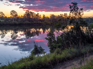 Beautiful Riverside Sunset with Reflections