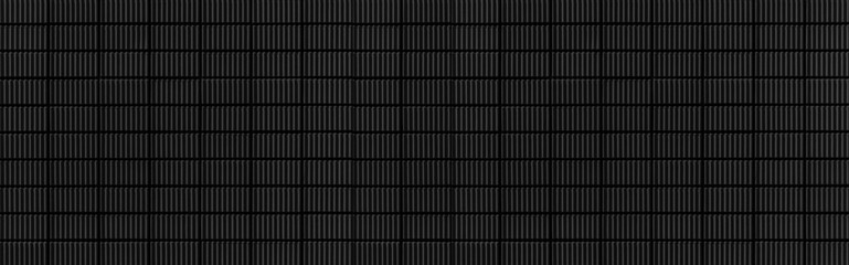 Panorama of Modern black stone wall with stripes texture and seamless background