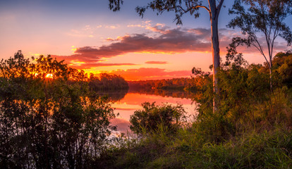 Beautiful Panoramic Riverside Sunset with Reflections