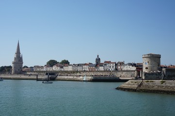 Fototapeta na wymiar La Rochelle, vue sur les tours du ports, tour des Chaines, tour Saint Nicolas, tour de l'horloge - Charente Maritime - France