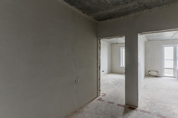 Russia, Moscow- February 10, 2020: interior room apartment rough repair for self-finishing. interior decoration, bare walls of the premises, stage of construction