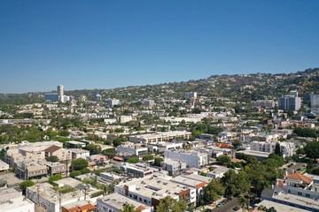 Fototapeta na wymiar Aerial Photography of Residential Neighborhood in California and City Skyline