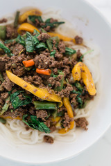 Delicious Chinese Stir-Fry using Ground Beef, Yellow Bell Peppers, Thai Basil, and Chili Peppers. 