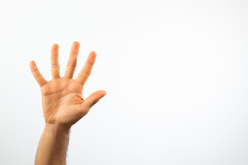 hand waving on a white background with high key effect