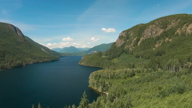 Aerial 4k View of Canadian Mountain Landscape during a sunny summer day. Taken near Powell River, Sunshine Coast, British Columbia, Canada.