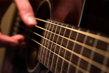 Man playing acoustic guitar