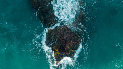 waves hitting rocks at sunny wether , aerial view, view at 90 degrees costa blanca , alicante , Spain  © Bas