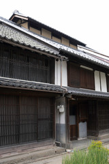 Old house with small roof in Unno Station on Hokkoku Road in Tomi City, Nagano Prefecture