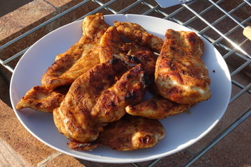 Plated Barbecue Chicken on Grill