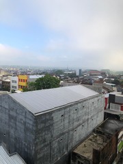 Fototapeta premium view from the sky of a small town in Indonesia, aerial view of the city of Jember.