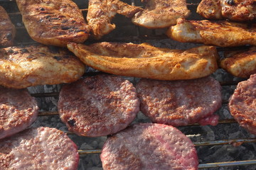 Barbeque Chicken and Beef Burgers on Grill