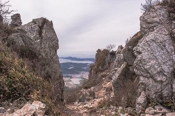 Scenic mountainscape with rock cliffs during mountain hiking.