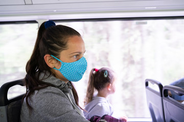 Woman On Bus Wearing Face Mask