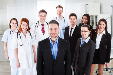 Boss standing on front of his team