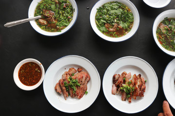 grilled pork , pork steak and spicy soup