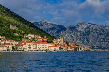 Fototapeta na wymiar Panorama of Perast in Kotor Bay day with mountains in the background, Montenegro
