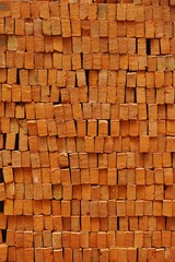 Bricks stacked in irregular rows abstract vertical background texture