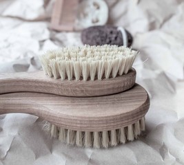 Zero waste massage brush. Shadow trend Crumpled kraft paper