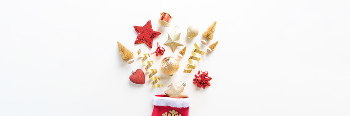 Christmas tree toys fall out of the mitten.