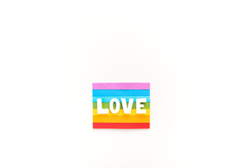 Rainbow flag paper craft. LGBT people parade concept