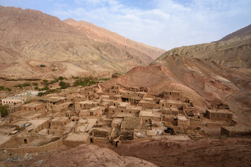 Ancient Tuyoq or Tuyugou or Tuyuk oasis-village in the Taklamakan desert near Turpan, Xinjiang,...