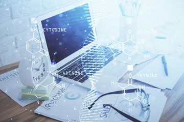 Desktop computer background and DNA drawing. Double exposure. Science concept.