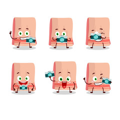 Photographer profession emoticon with towel cartoon character
