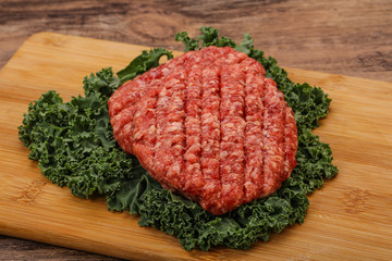 Raw beef burger cutlet for cooking