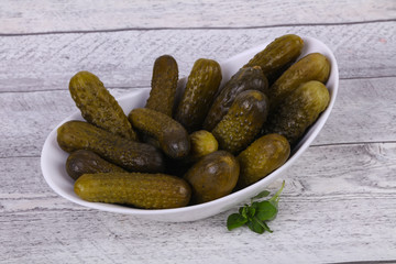 Pickled cucumbers heap in the bowl